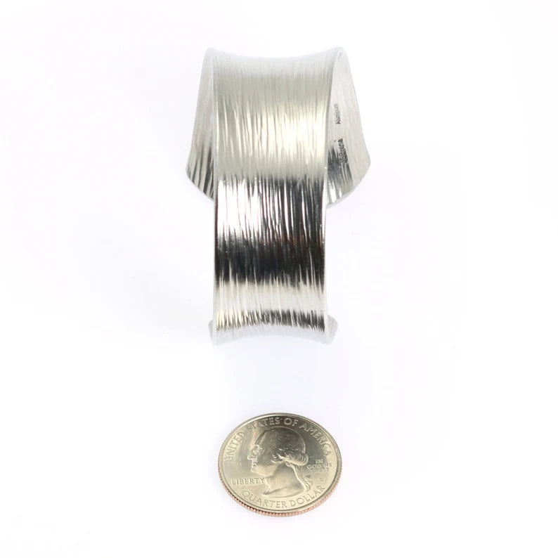Tapered Bark Anticlastic Aluminum Bangle Bracelet Width Compared to a US Quarter Coin