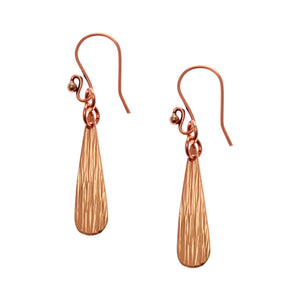 1 of 7: A Pair of Bark Embossed Mini Copper Teardrop Earrings on a White Background