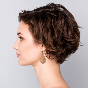 2 of 8: Fashionable Woman Wearing Bark Embossed Small Teardrop Earrings
