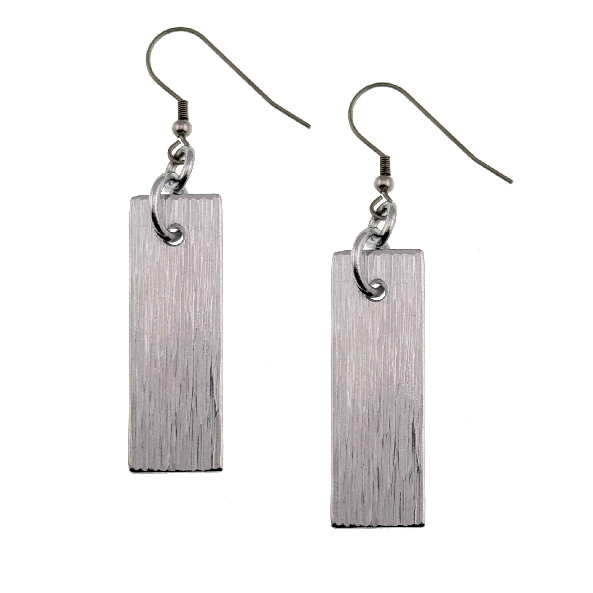 A Pair of Aluminum Bark Dangle Earrings on a White Background