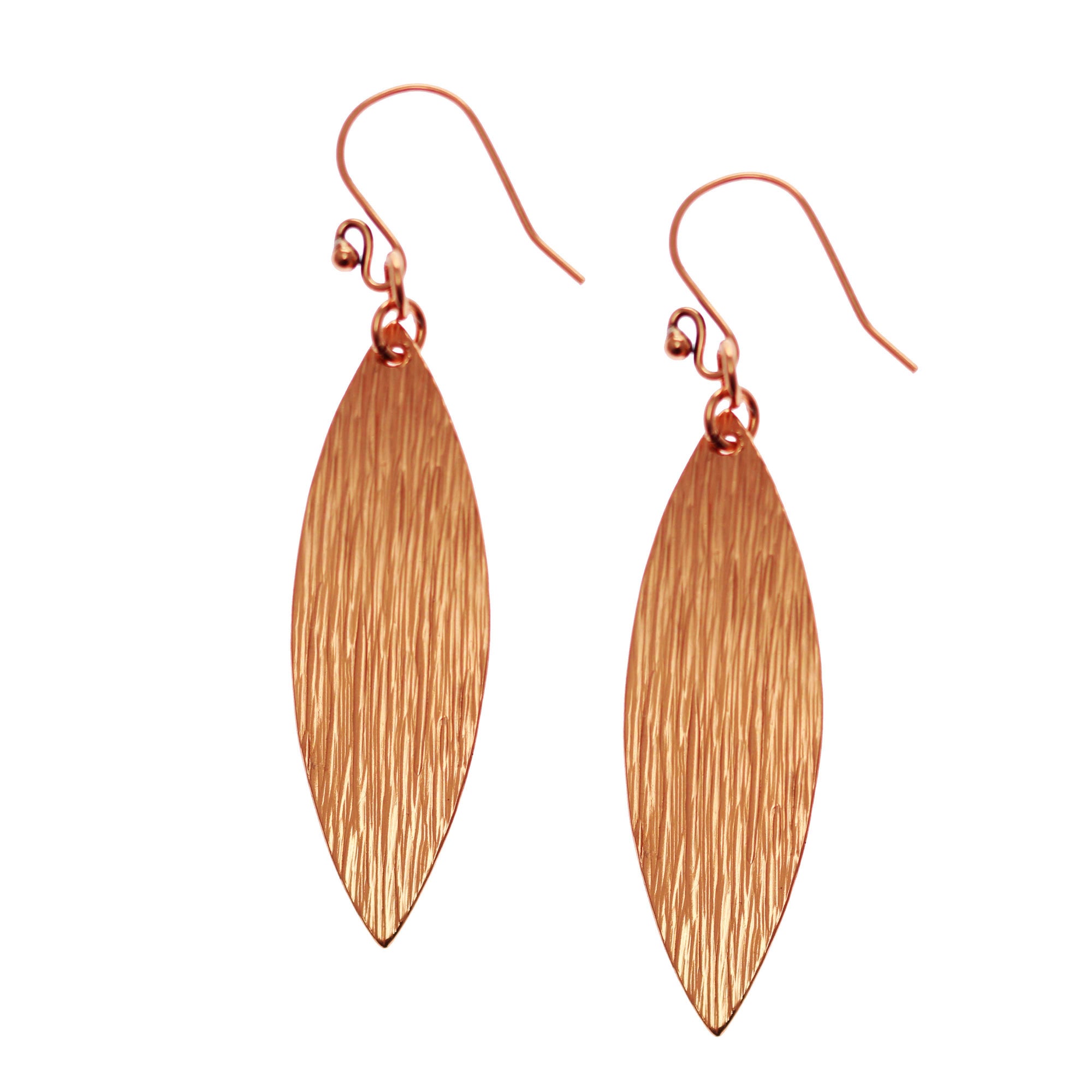 A Pair of Bark Embossed Copper Leaf Drop Earrings on a White Background