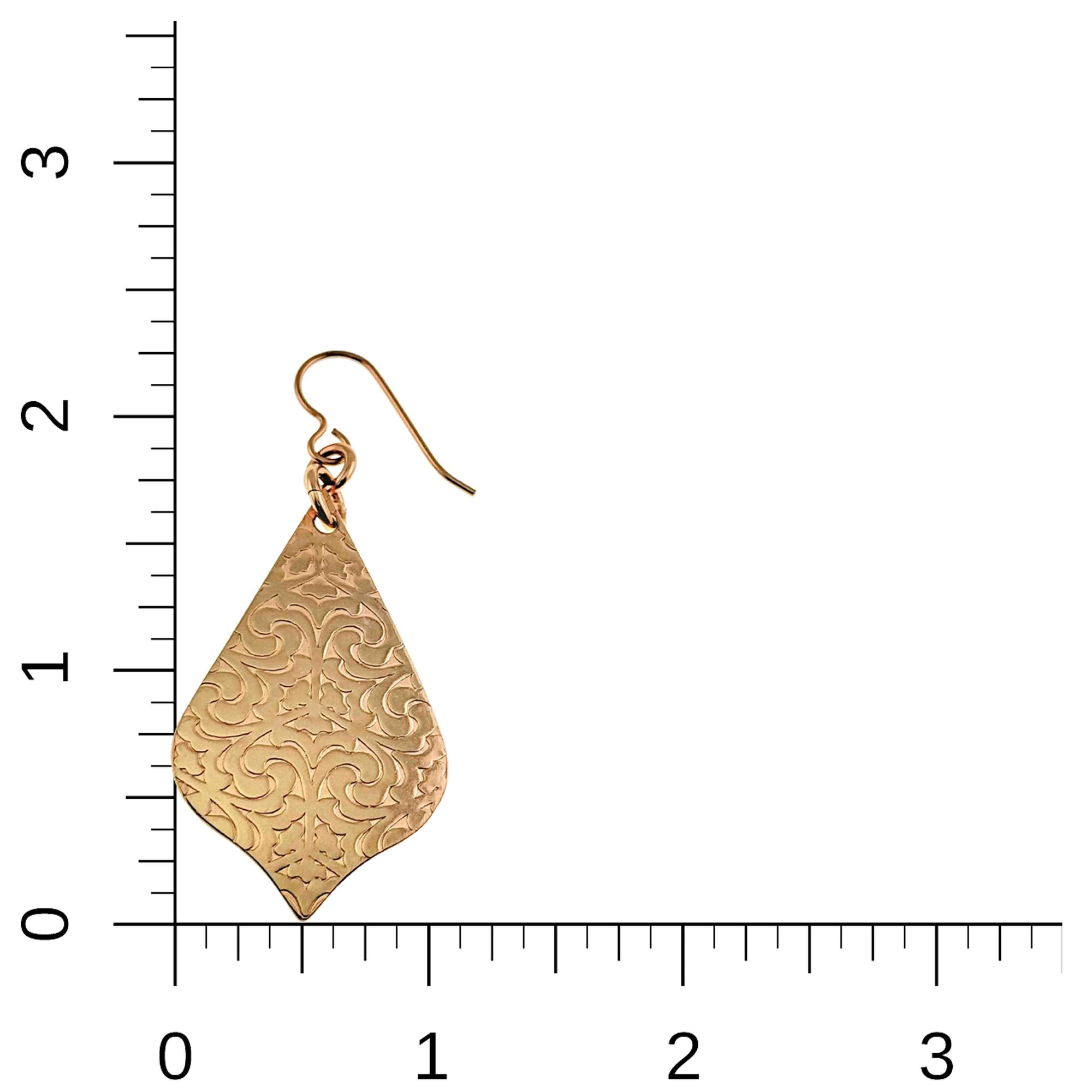 Bronze Damask Arabesque Drop Earring  with intricate design on a ruler for scale