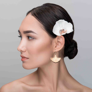 6 of 7: An Elegant Woman Wearing Bronze Ginkgo Leaf Earrings