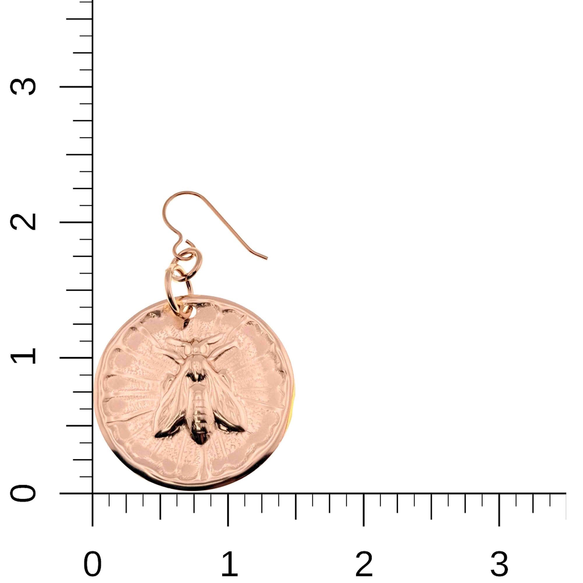Bronze Queen Bee Disc Drop Earrings on a ruler for scale