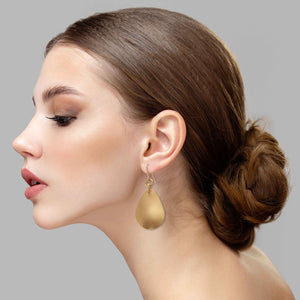 2 of 8: Elegant Woman Wearing Brushed Bronze Medium Teardrop Earrings