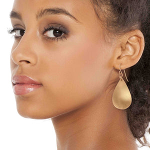 4 of 7: Stunning Woman Wearing Brushed Bronze Teardrop Earrings