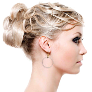 6 of 7: An Elegant Woman Wearing Chased Rim Aluminum Hoop Earrings