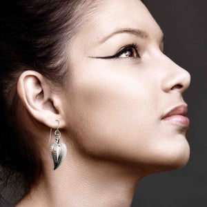 6 of 6: A Stunning Woman Wearing Chili Pepper Aluminum Drop Earrings 