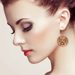 6 of 7: Stunning Redhead Wearing Chinese Foo Dog Copper Disc Earrings