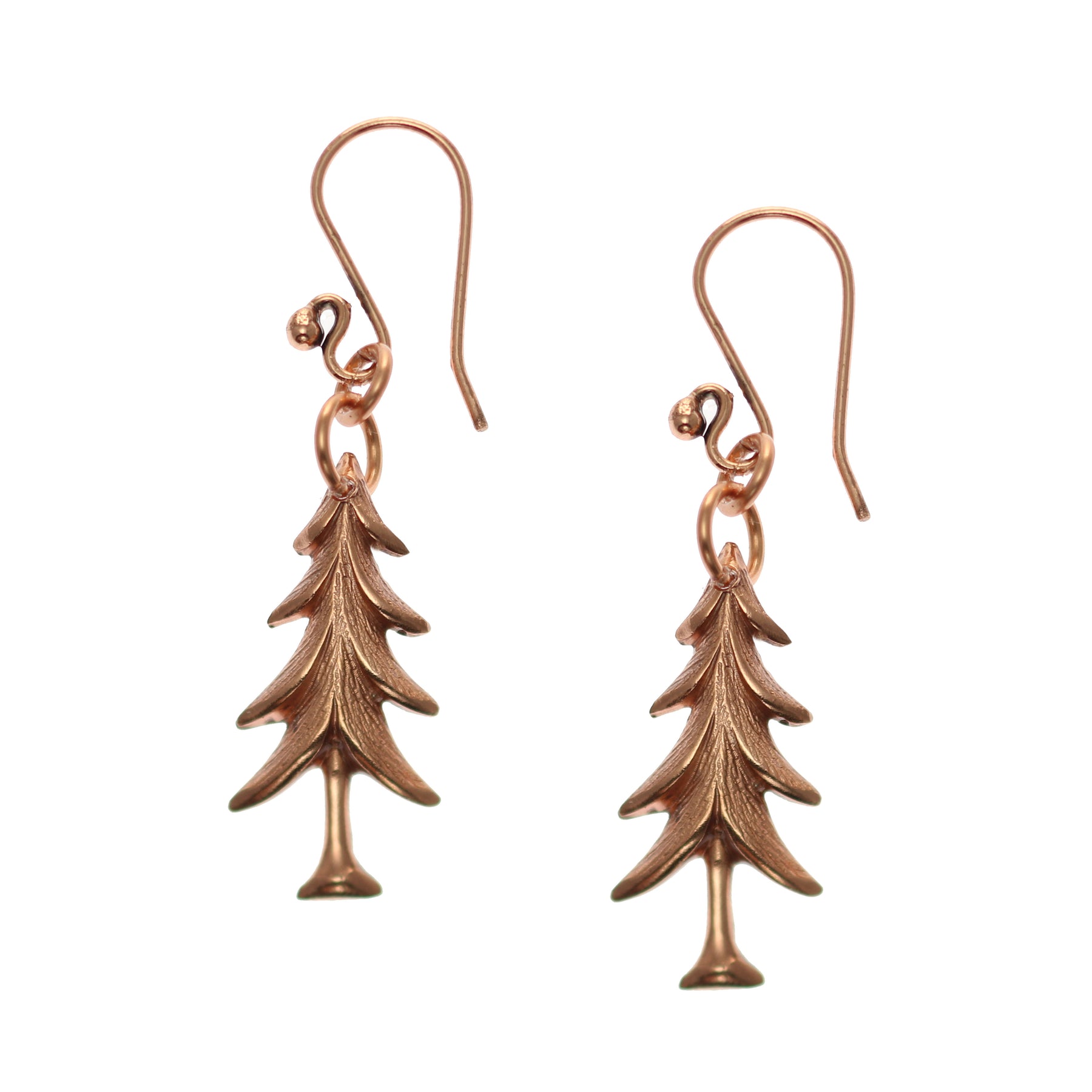 A Pair of Christmas Tree Charm Copper Dangle Earrings on a White Background