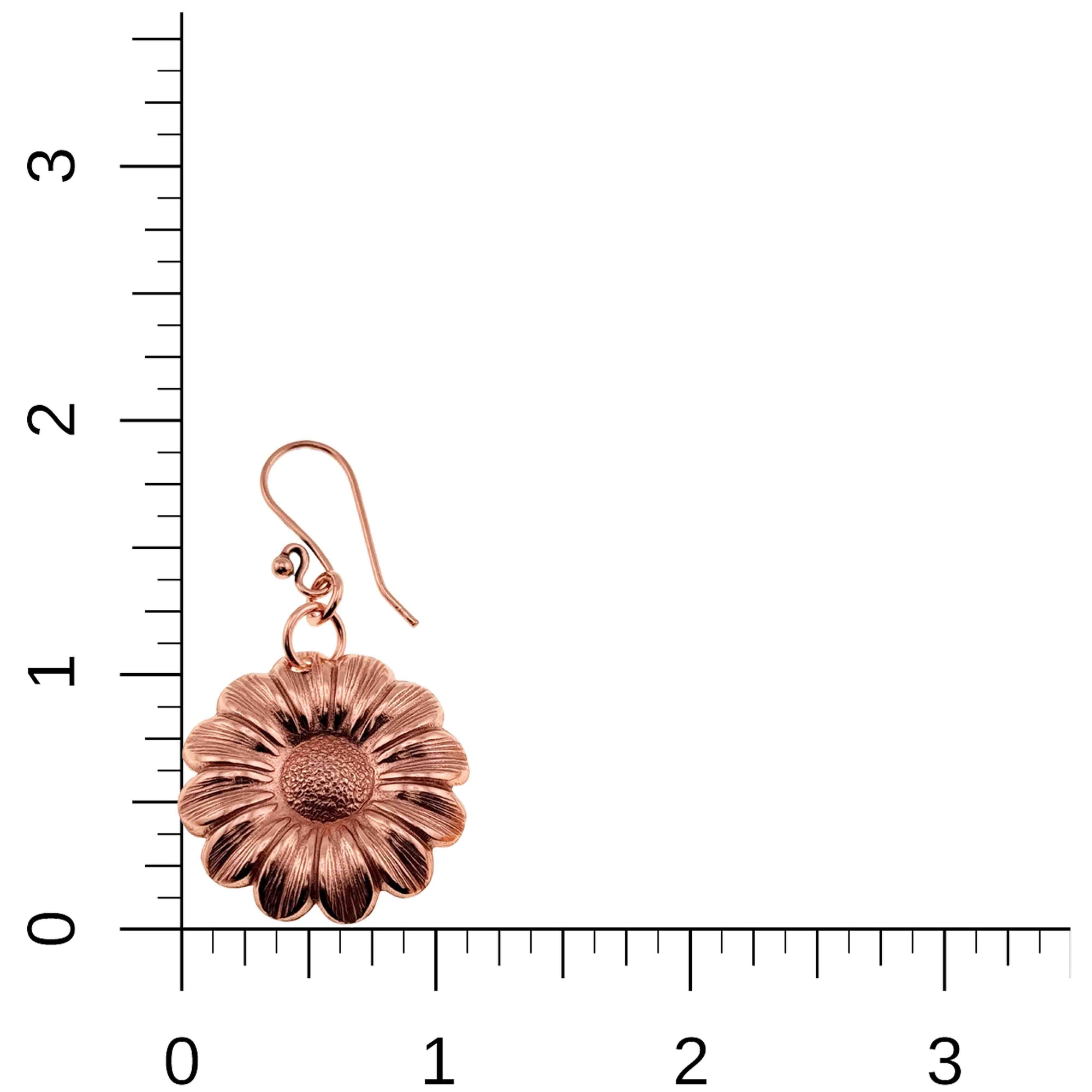 Copper Daisy Disc Drop Earring  on a ruler for scale