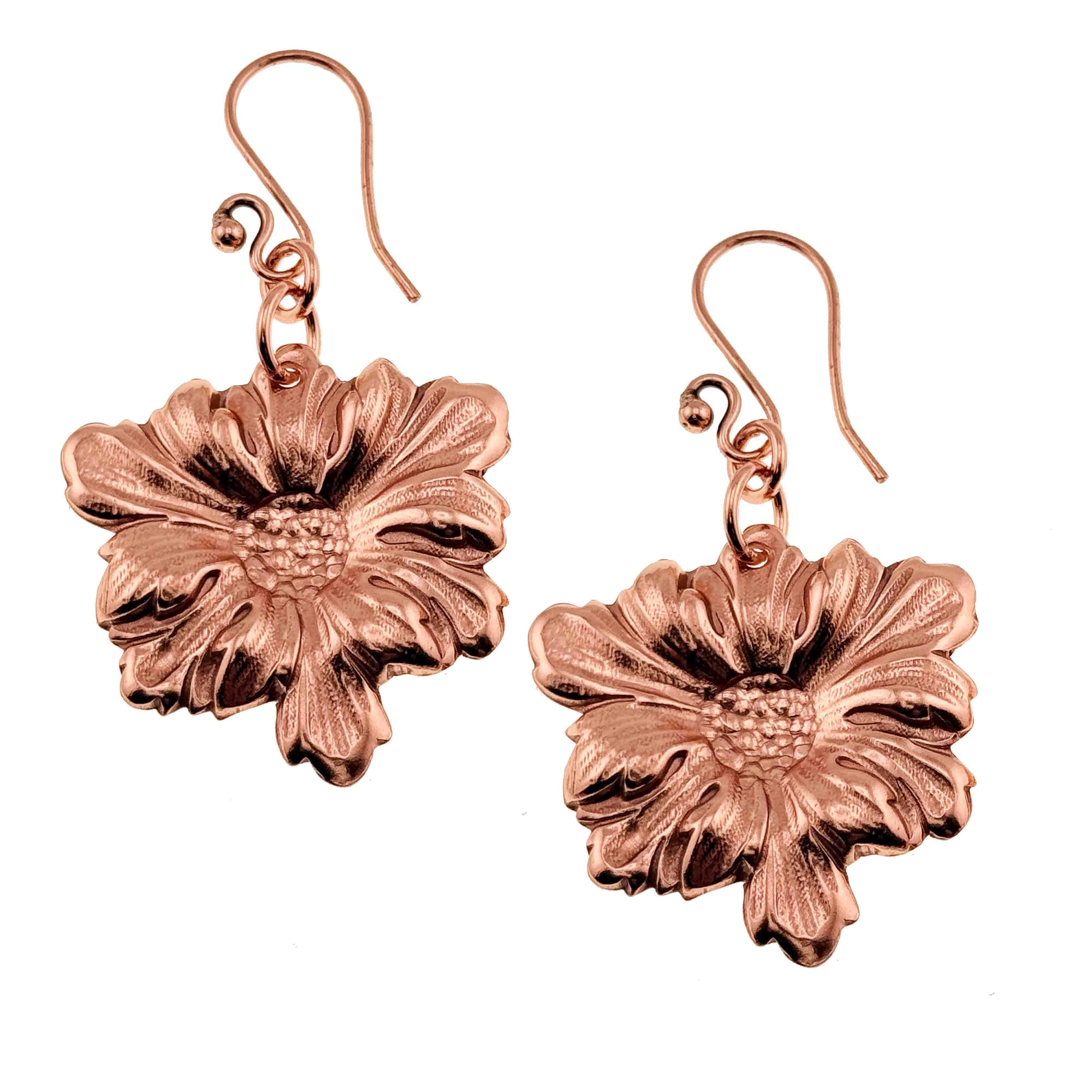 A Pair of Dogwood Blossom Copper Drop Earrings on a White Background