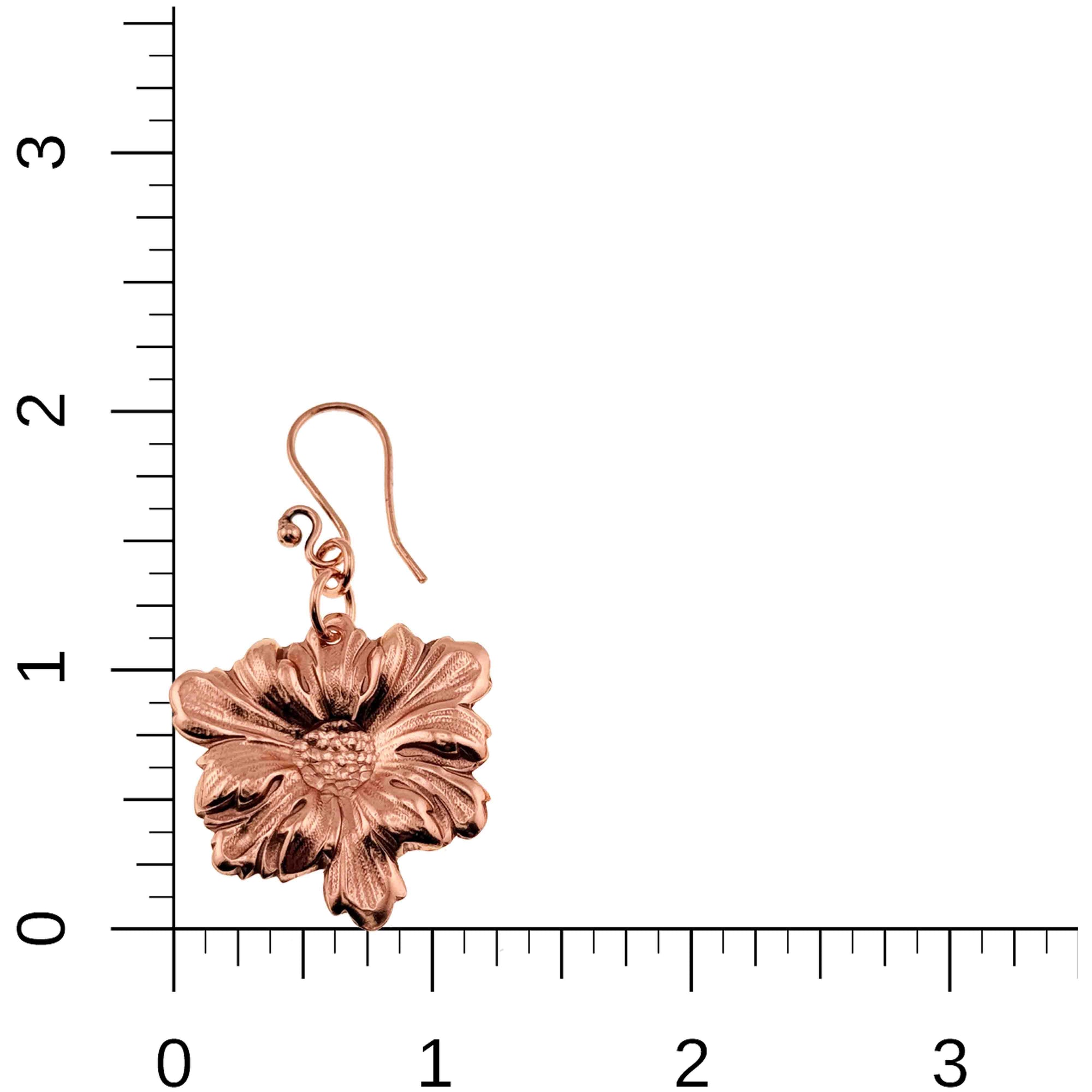 Dogwood Blossom Copper Drop Earrings on a ruler for scale
