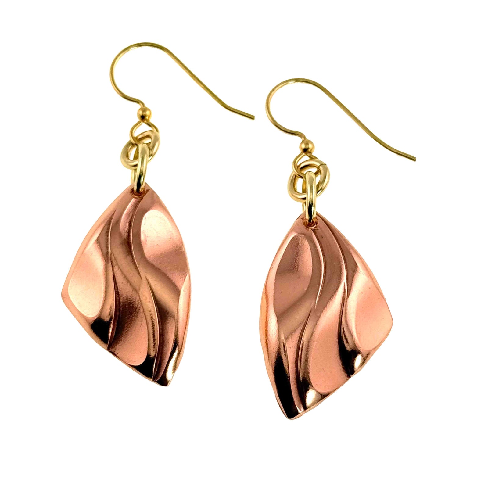 Pair of polished copper flame petal dangle earrings with brass French ear wires. Each earring features a diamond shaped copper drop with flowing, die struck flame patterns that create depth and movement. The warm, rosy copper surface is smooth and reflective, hanging from small brass rings and hooks for a modern, handcrafted look.