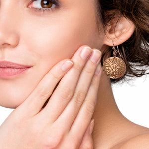 2 of 8: Fashionable Woman Wearing Chrysanthemum Copper Disc Earrings