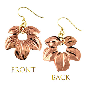 3 of 7: Front and back view of handcrafted copper petal blossom dangle earrings with polished die struck floral detailing and open center design, shown with brass French ear wires on a clean white background.