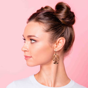 4 of 7: A Chic Woman Wearing Copper Phoenix Firebird Drop Earrings