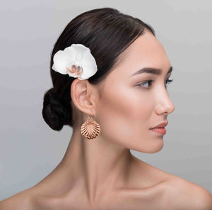 2 of 7: A Chic Woman Wearing Copper Scallop Shell Dangle Earrings