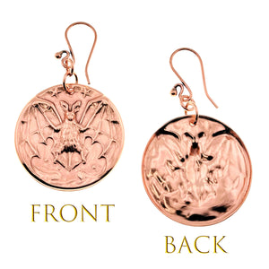 3 of 8: Copper Vampire Bat Disc Dangle Earrings showing front and back designs on a white background