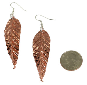 3 of 6: Size of Corrugated Fold Formed Copper Leaf Earrings compared to a US Quarter Coin