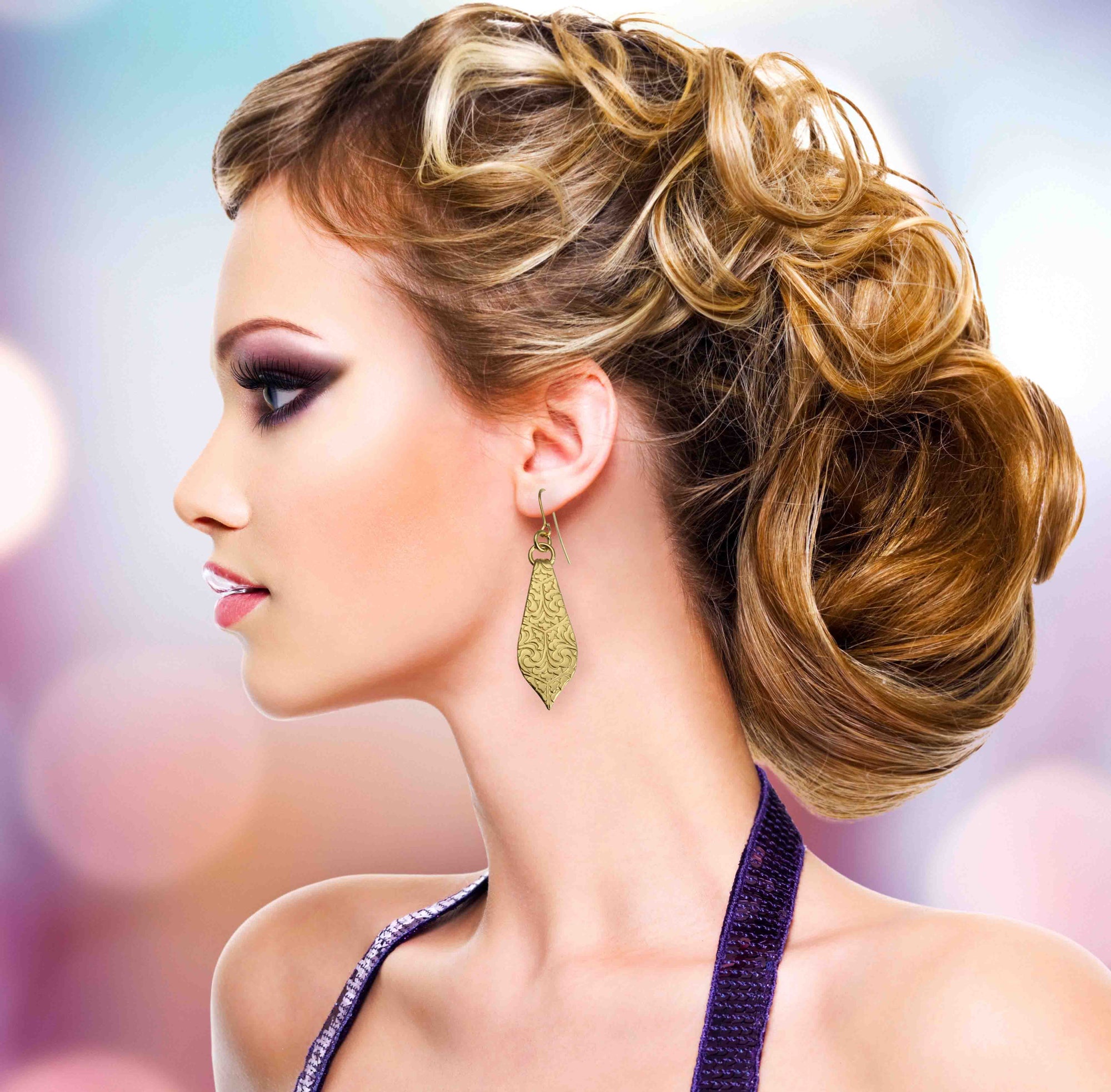 Glamorous Female Model Wearing Damask Embossed Brass Nu Gold Marrakesh Teardrop Earrings