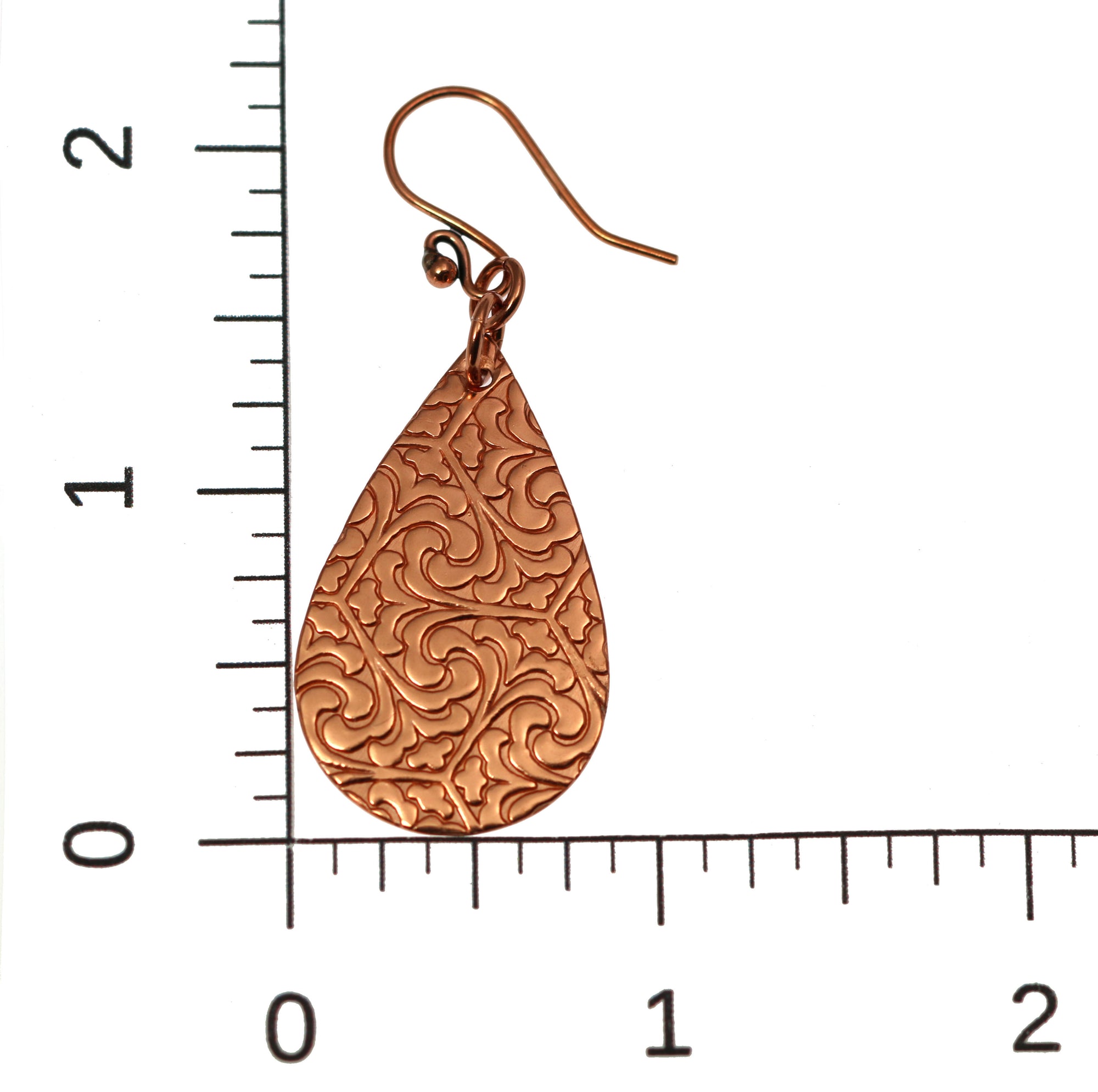Damask Embossed Small Copper Teardrop Earrings on Ruler for Size