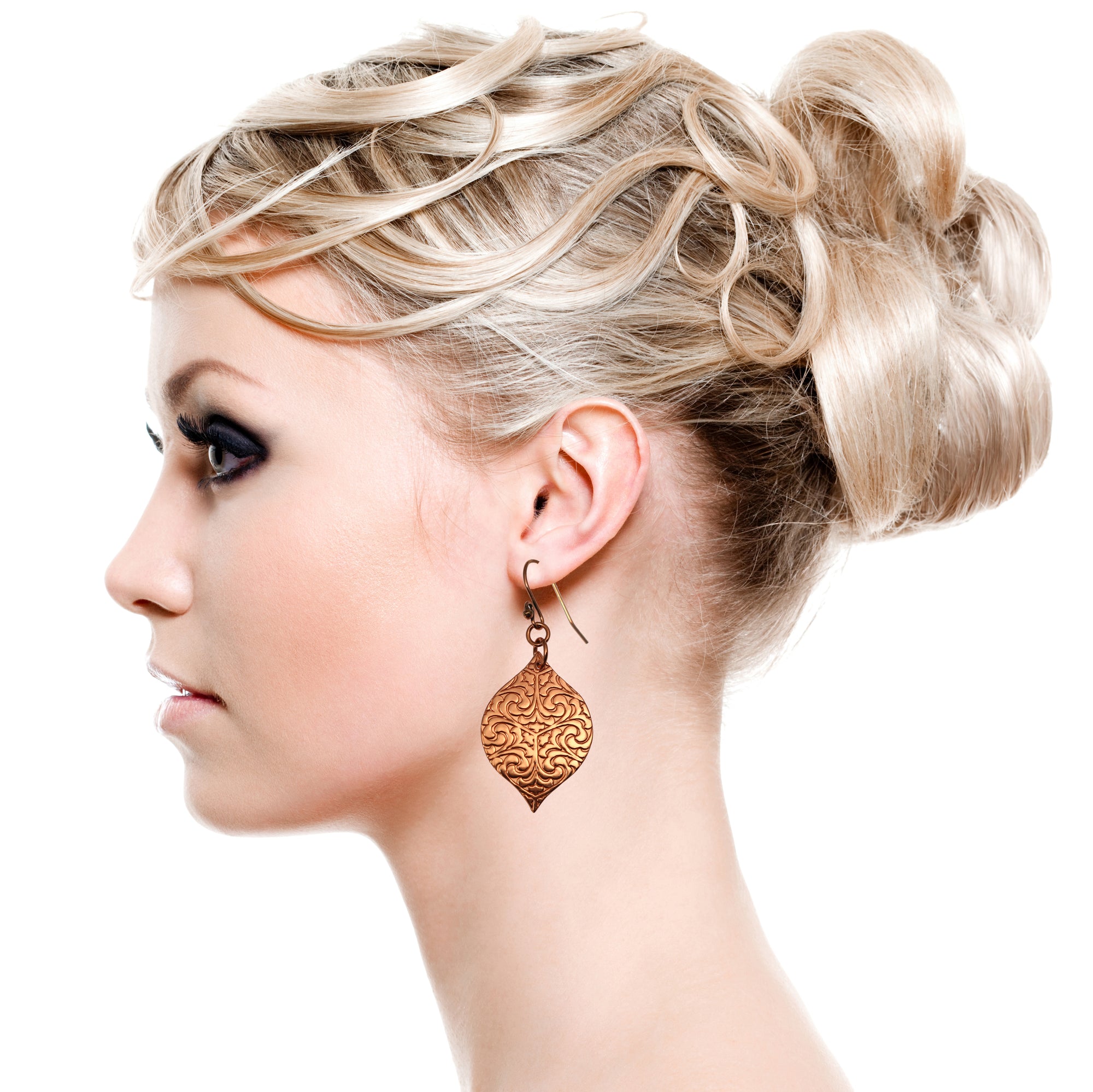 Blonde Female Model Wearing Damask Embossed Marrakesh Copper Drop Earrings