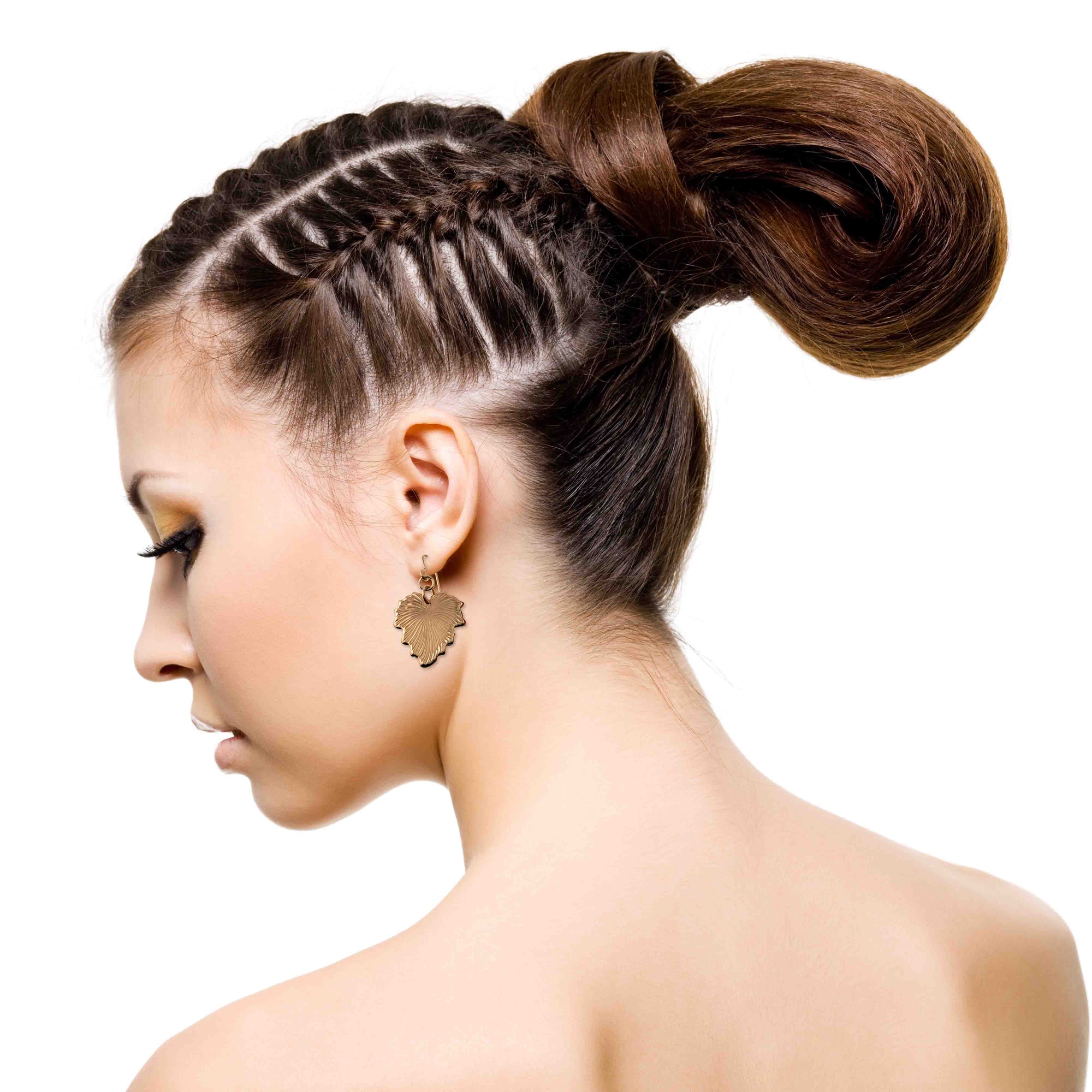 Woman with braided hair styled into a bun wearing Grape Leaf Bronze Dangle Earring on a white background