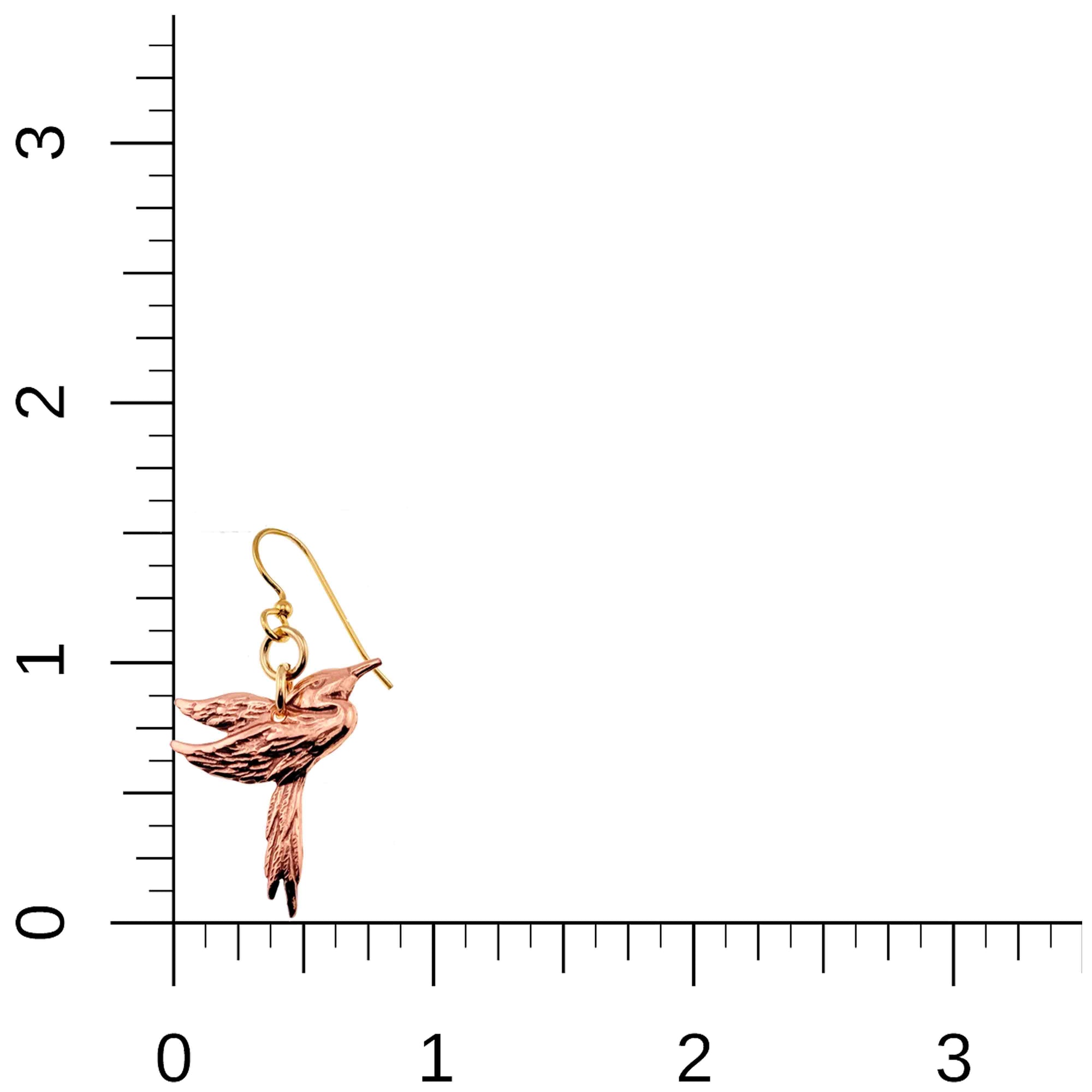 Great Blue Heron Copper Dangle Earring on a ruler for scale