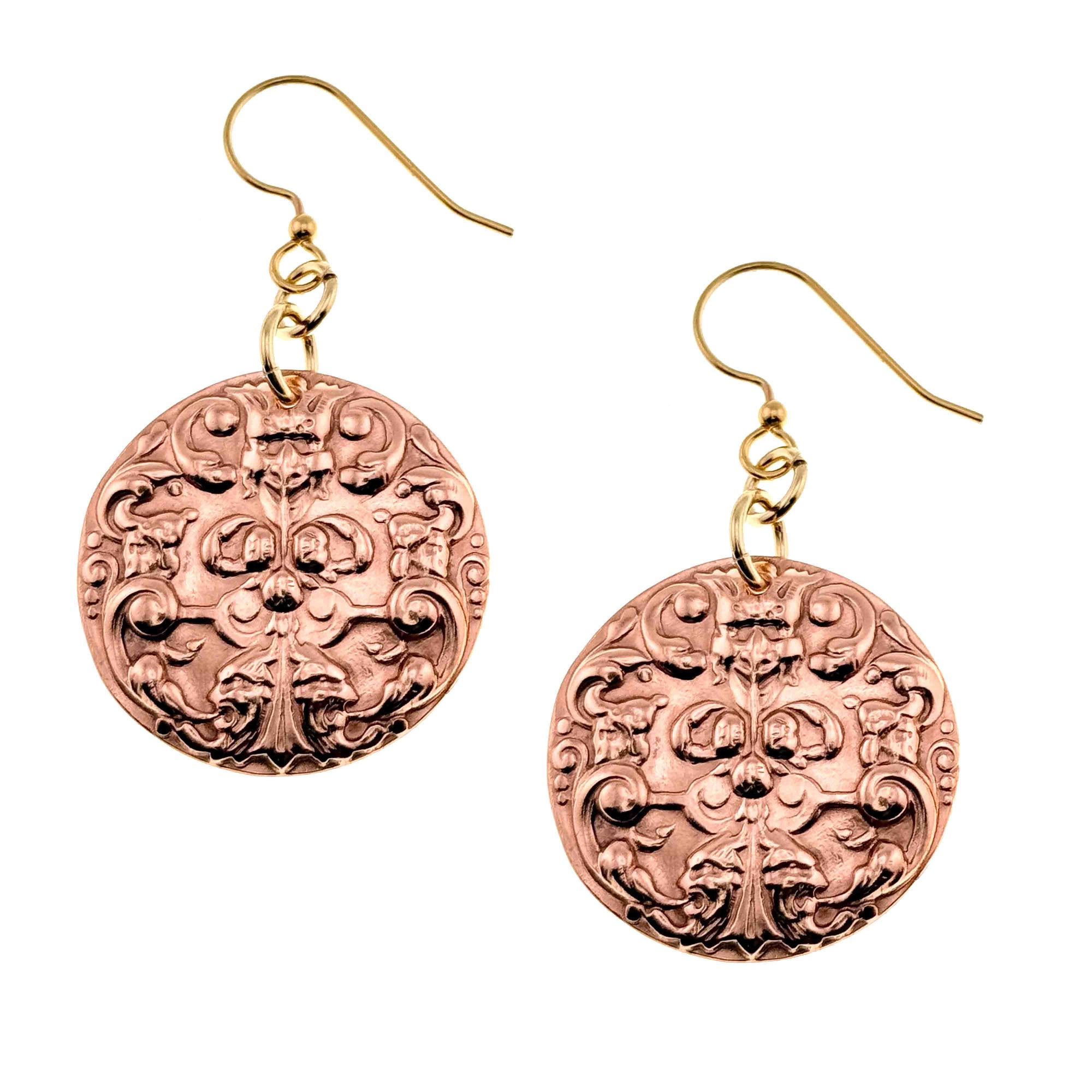 A Pair of Green Man Forest Medallion Disc Earrings on a White Background