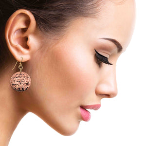 5 of 7: An Elegant Woman Wearing Green Man Forest Medallion Disc Earrings