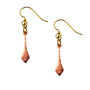1 of 7: Pair of Hammered Copper Diamond Tip Drop Earrings displayed on a white background. The slim polished copper drops feature hand hammered texture, pointed diamond shaped tips, small gold tone connecting rings, and brass French ear wires.