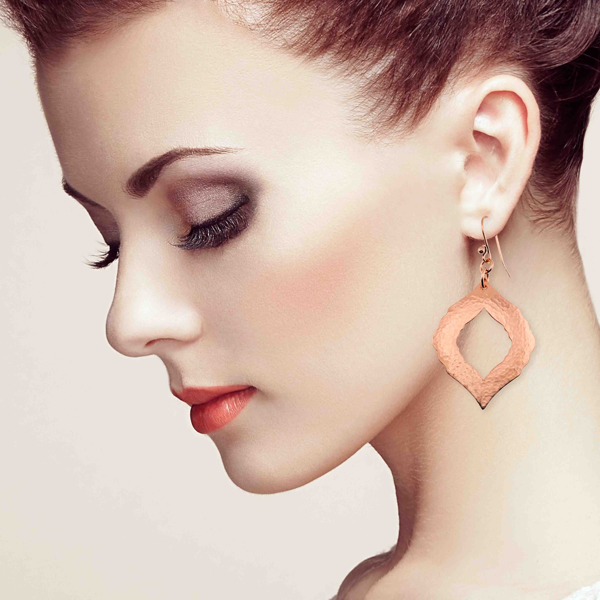 A Chic Redhead Wearing Hammered Copper Pierced Moroccan Drop Earrings