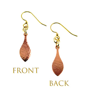 3 of 7: Front and back views of a hammered copper raindrop earring on a white background. The front shows a bright hand hammered texture with a polished copper finish, while the back appears smoother. Each earring hangs from a brass French ear wire with small connecting rings. Gold text labels the two views as Front and Back.