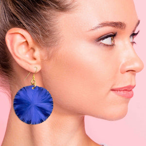 2 of 7: A Stylish Woman Wearing Large Cobalt Blue Lily Pad Anodized Aluminum Leaf Earrings