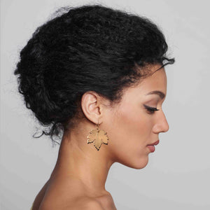 4 of 7: A Chic Woman Wearing Large Maple Leaf Bronze Dangle Earrings