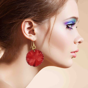 6 of 7: A Stylish Woman Wearing Large Red Anodized Aluminum Lily Pad Earrings