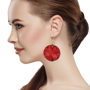 4 of 7: A Stunning Woman Wearing Large Red Anodized Aluminum Lily Pad Earrings