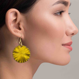 6 of 7: A Chic Woman Wearing Medium Canary Yellow Anodized Aluminum Lily Pad Earrings