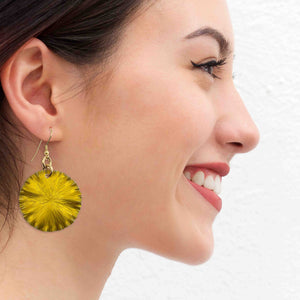 4 of 7: A Smiling Woman Wearing Medium Canary Yellow Anodized Aluminum Lily Pad Earrings