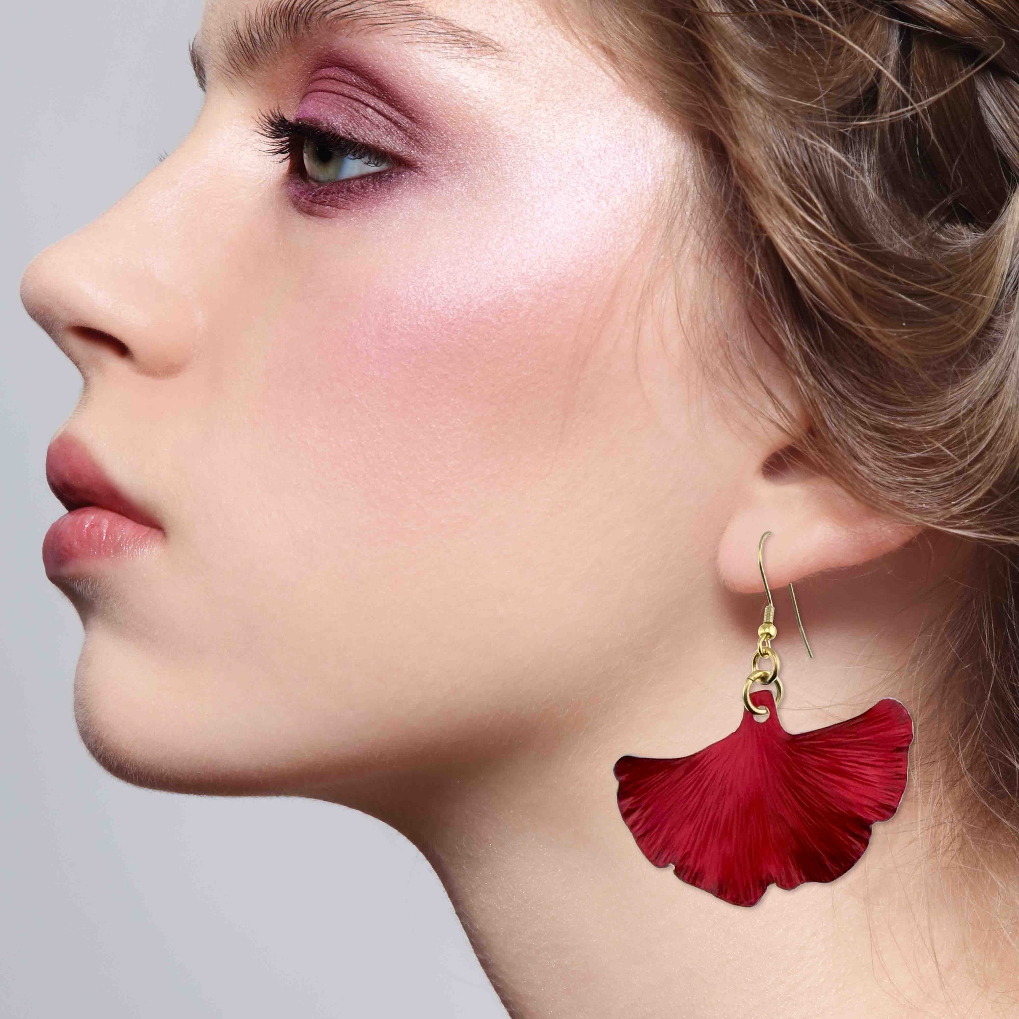 Elegant Woman Wearing Medium Candy Apple Red Anodized Aluminum Ginkgo Leaf Earrings