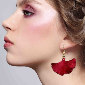 4 of 7: Elegant Woman Wearing Medium Candy Apple Red Anodized Aluminum Ginkgo Leaf Earrings