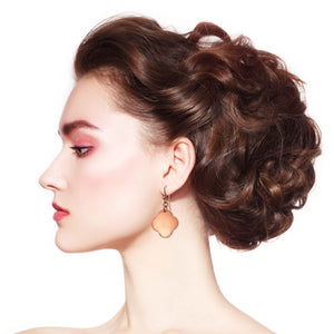 2 of 7: An Elegant Woman Wearing Medium Hammered Copper Clover Drop Earrings