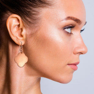 4 of 7: A Stunning Woman Wearing Medium Hammered Copper Clover Drop Earrings