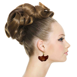 6 of 7: A Chic Woman Wearing Medium Henna Brown Anodized Ginkgo Leaf Earrings