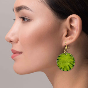 2 of 7: A Chic Woman Wearing Medium Lime Anodized Aluminum Lily Pad Earrings 
