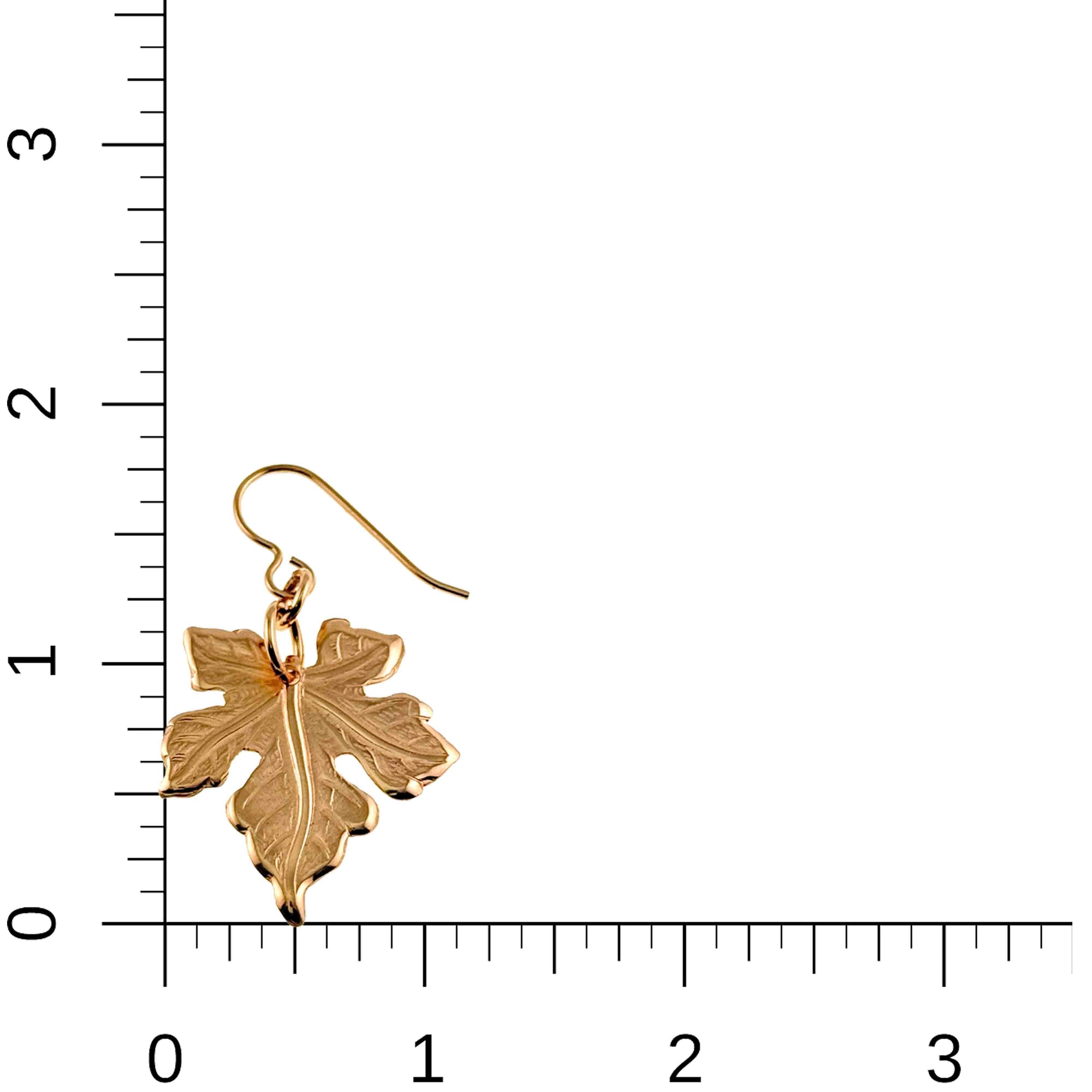 Medium Maple Leaf Bronze Dangle Earring on a ruler for scale