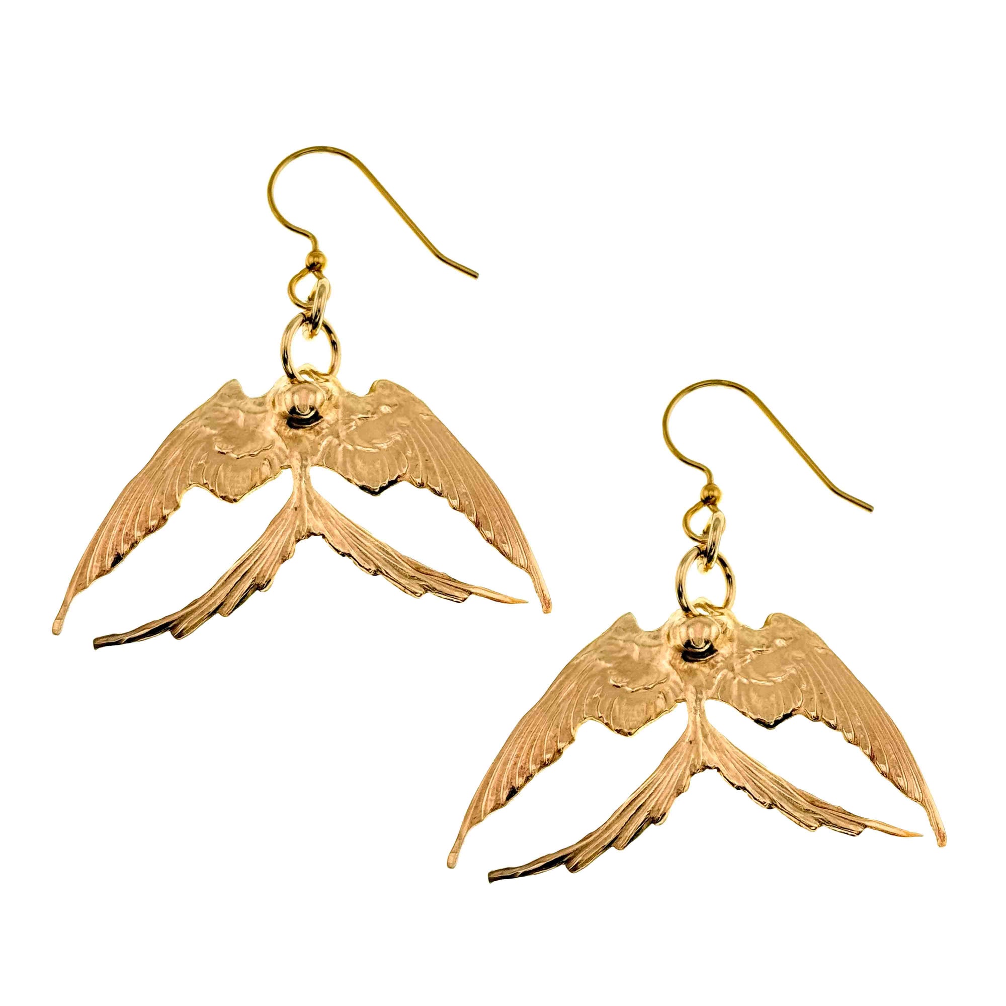 A Pair of Medium Nu Gold Brass Swallow Earrings  on a White Background