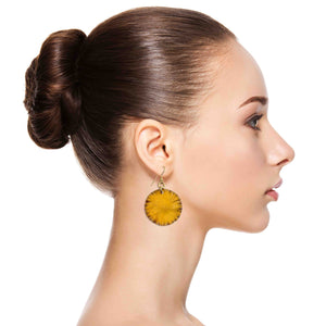 6 of 7: A Fashionable Woman Wearing Medium Orange Anodized Aluminum Lily Pad Earrings