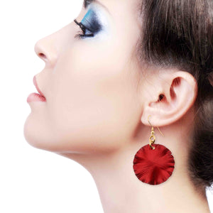 6 of 7: A Chic Woman Wearing Medium Red Anodized Aluminum Lily Pad Earrings